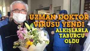 Korona olan doktor, meslektaşlarının alkışlarıyla taburcu oldu